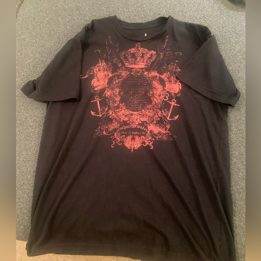 Buckle Aqua t shirt. Used but cool design on front. Black and pink